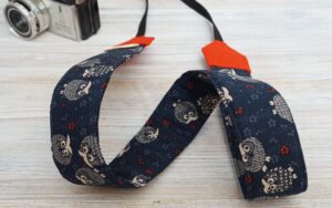 navy owl camera strap 2022 (16) (2) Cute owl prints on navy blue background, camera strap with red felt end tab