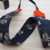 Cute owl prints on navy blue background, camera strap with red felt end tab